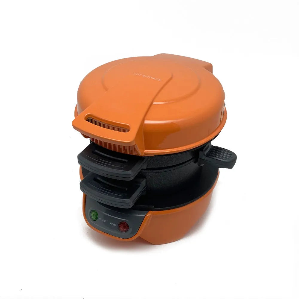Household breakfast sandwich and waffle maker with egg cooker ring in bright red colour