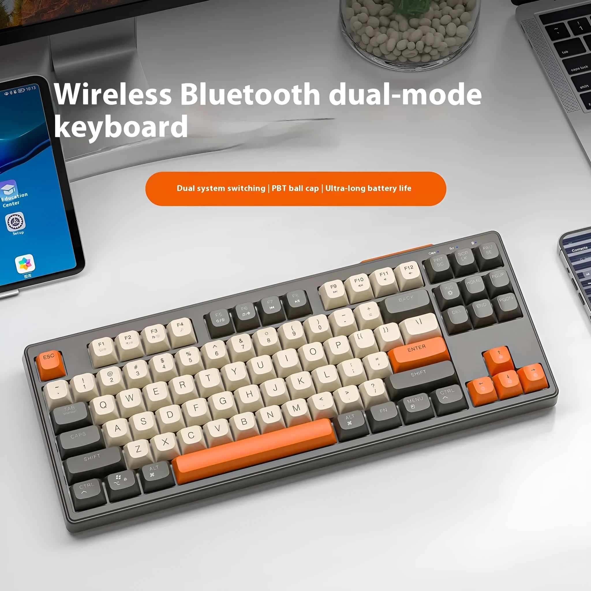 Free Wolf M87 wireless dual-mode keyboard in blueberry colour on a desk with USB receiver and cable.