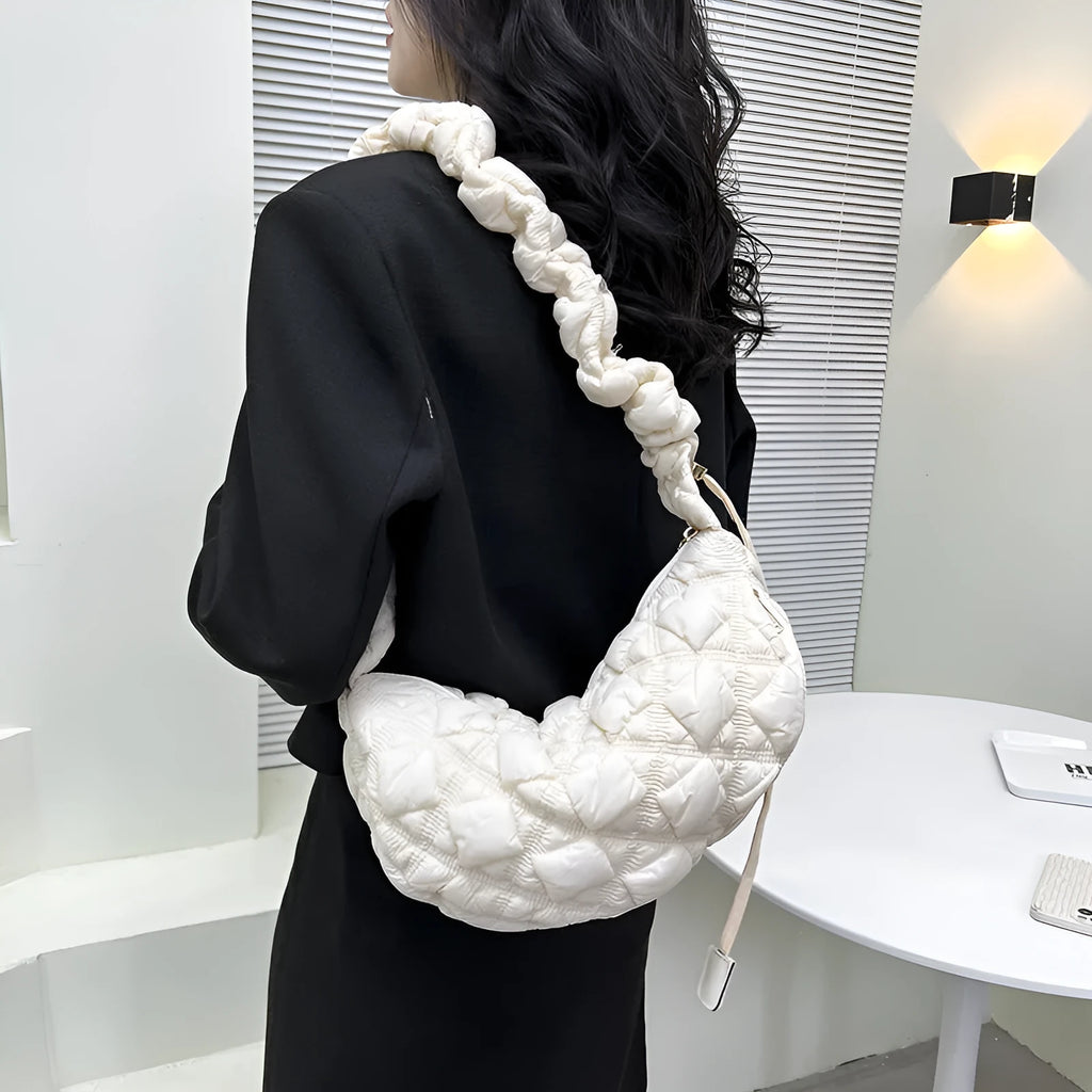Women's nylon messenger bag in a solid colour with adjustable shoulder strap showing 35cm width.