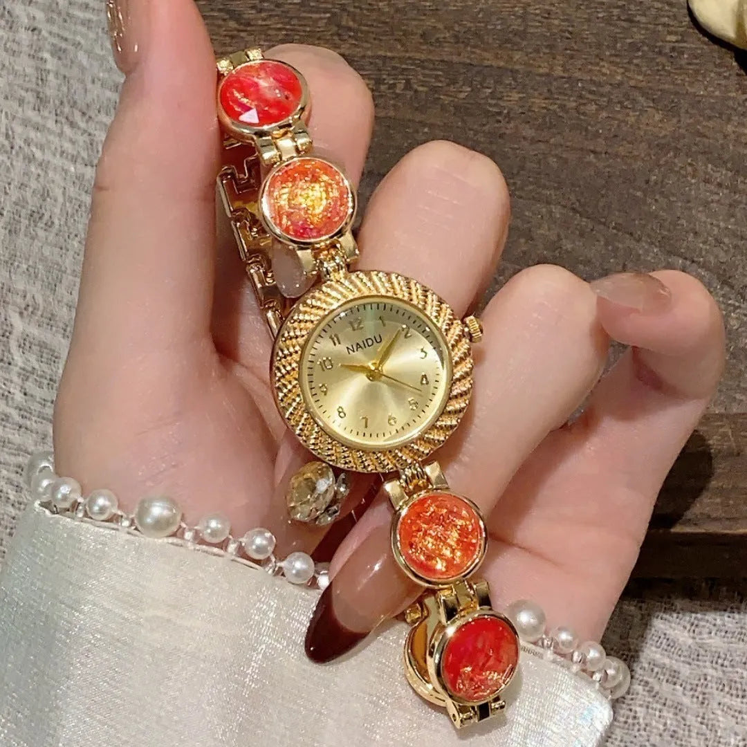 Women's quartz watch with 25mm round dial and zinc alloy case in one of six colours.