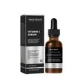 30ml vitamin C serum bottle with ascorbic acid vitamin E and nicotinamide on white background