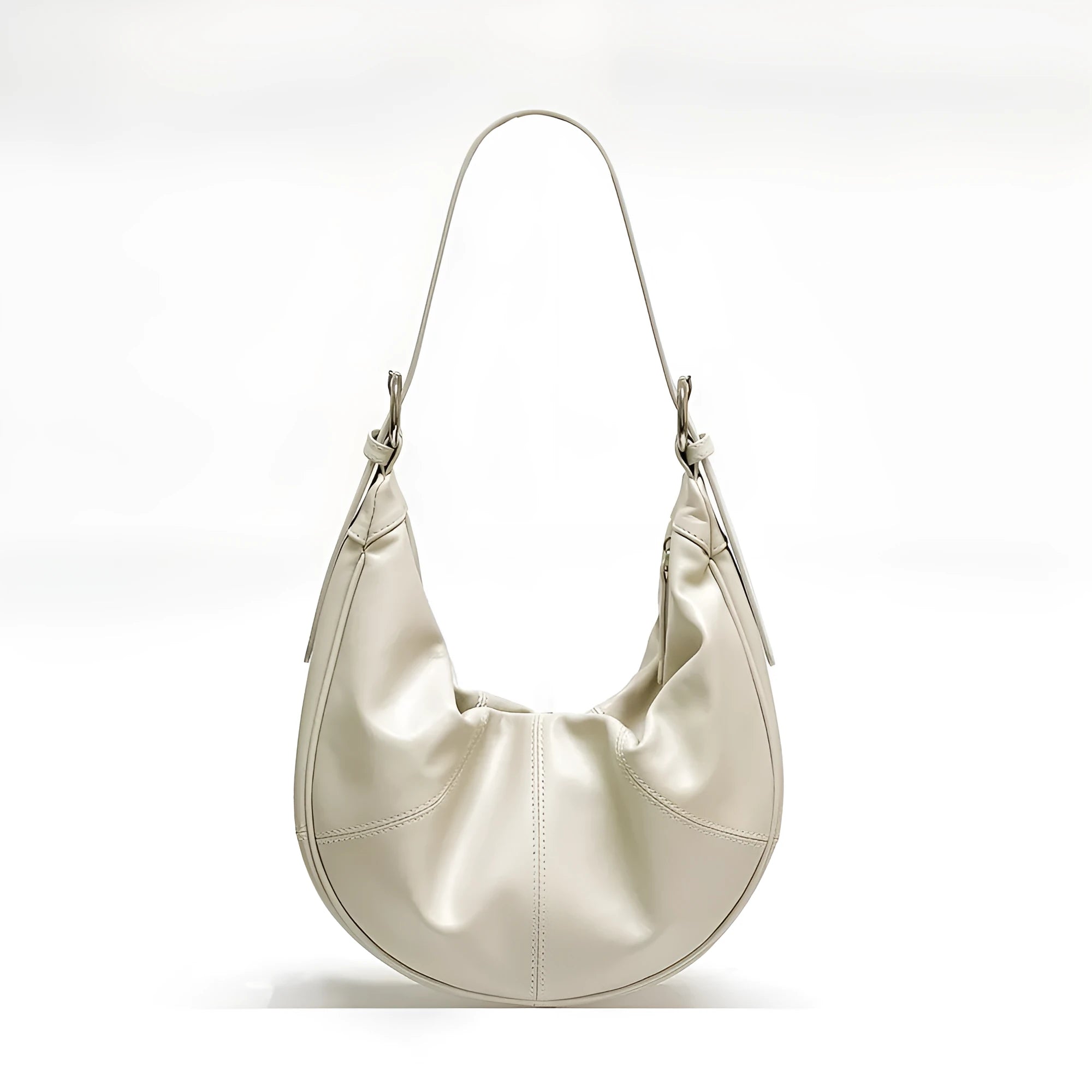 Women's soft cowhide leather shoulder bag with dumpling shape showing sandwich pocket and double joint straps