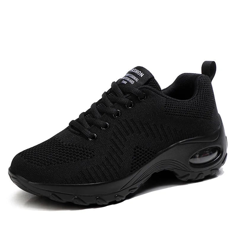 Red women's mesh sneakers with front lace-up and round toe design