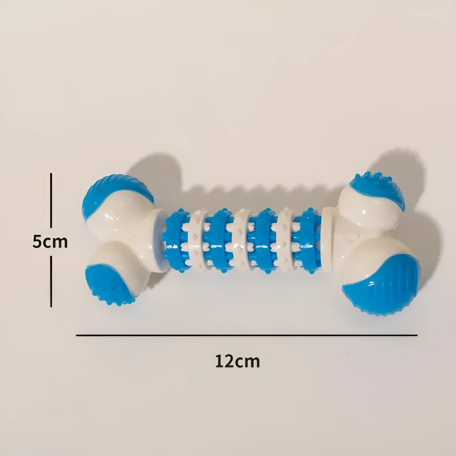 Blue bone-shaped interactive dog toy for small breeds with chewable ends and a treat holder in the centre.