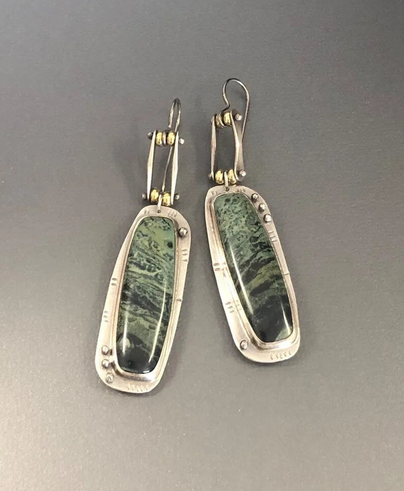 Two-tone geometric marble pattern alloy earrings with simple modern design