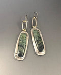 Two-tone geometric marble pattern alloy earrings with simple modern design