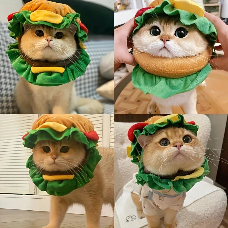 Burger-themed plush headdress collar for cats on a white background, showing adjustable strap and cartoon bun detailing.