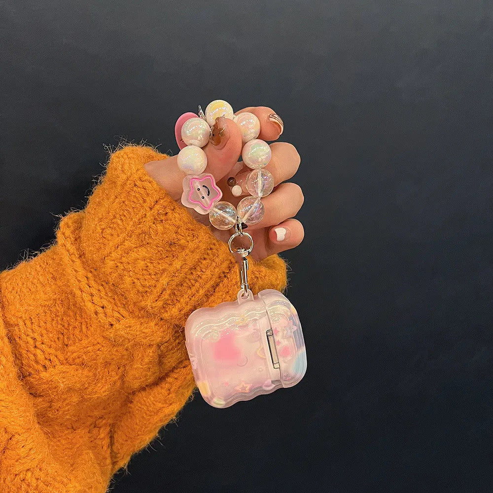 Pink transparent silicone AirPods case with gradual change star pattern and star hand rope