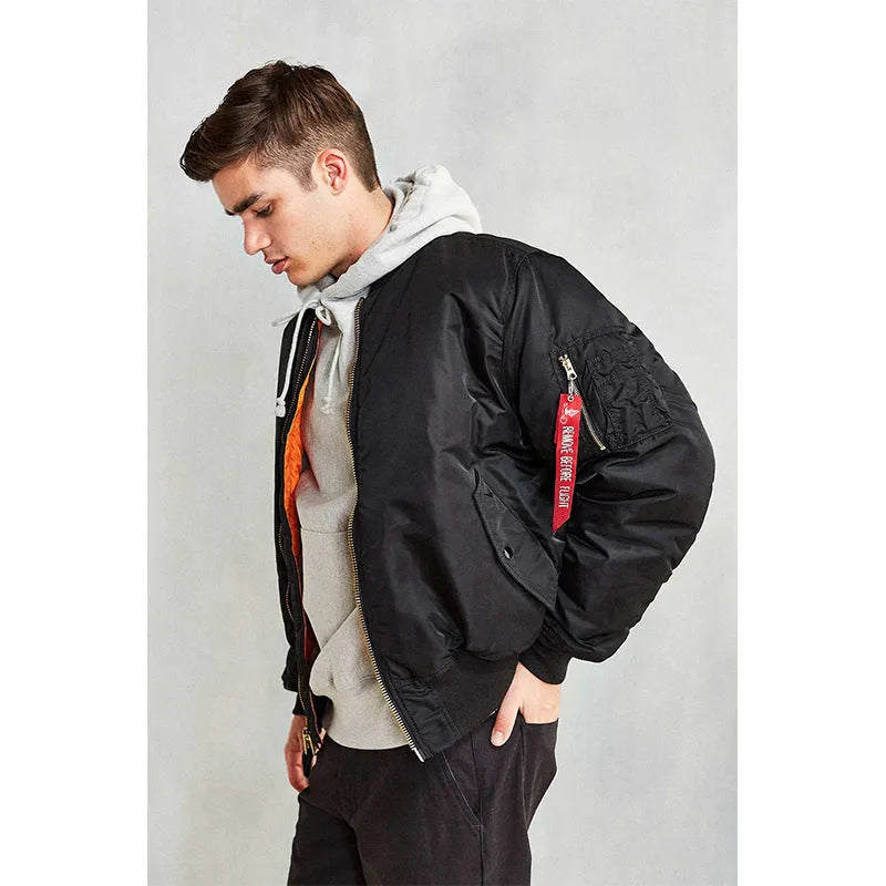 Men's loose-fit Army Green cotton-padded pilot jacket with wear-resistant nylon fabric on a hanger.
