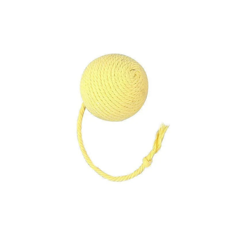 Cat toy ball with attached rope and bell in green, pink, purple or yellow colours showing 6cm and 3cm size comparison