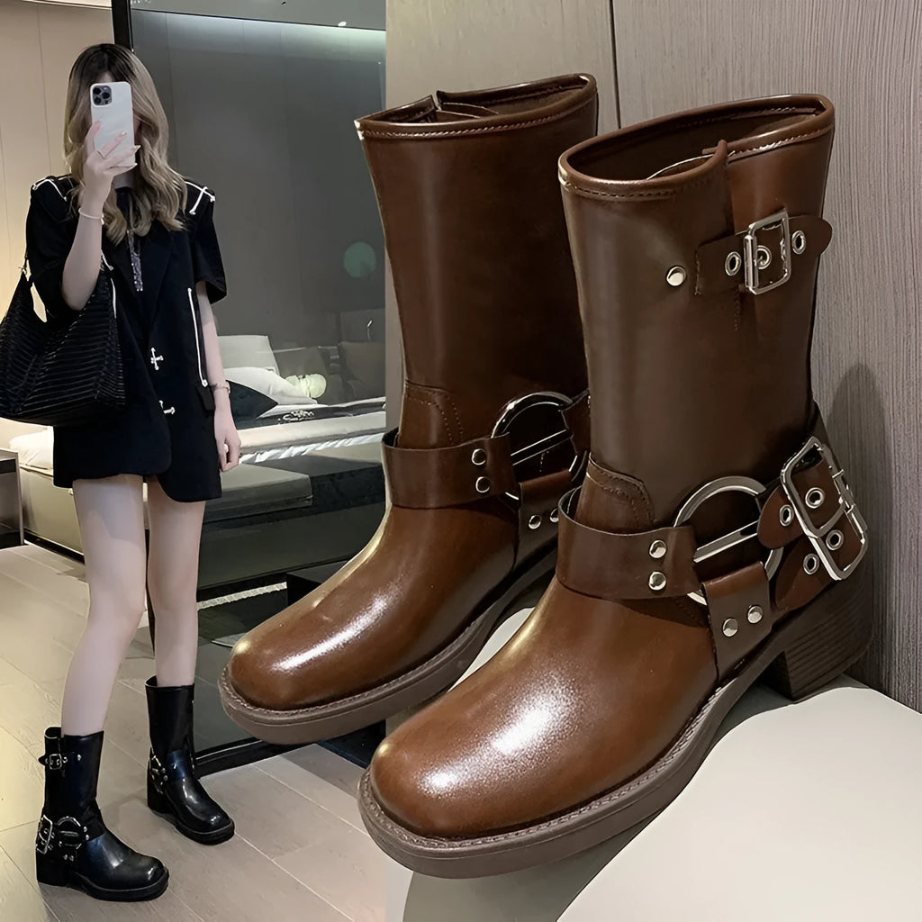 Women's black platform ankle boots with buckle detail and chunky sole