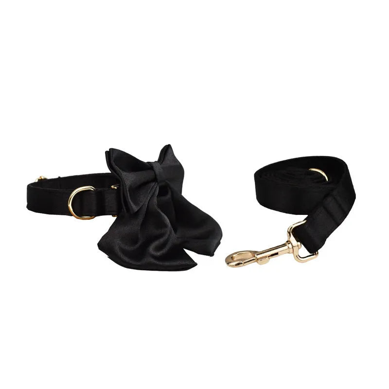 Cloth dog collar and leash set with matching harness vest and decorative bow in assorted colours.