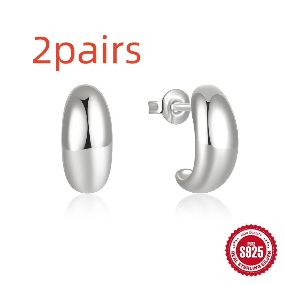 C-shaped sterling silver ringstud earring with electroplated gold or white gold glossy finish