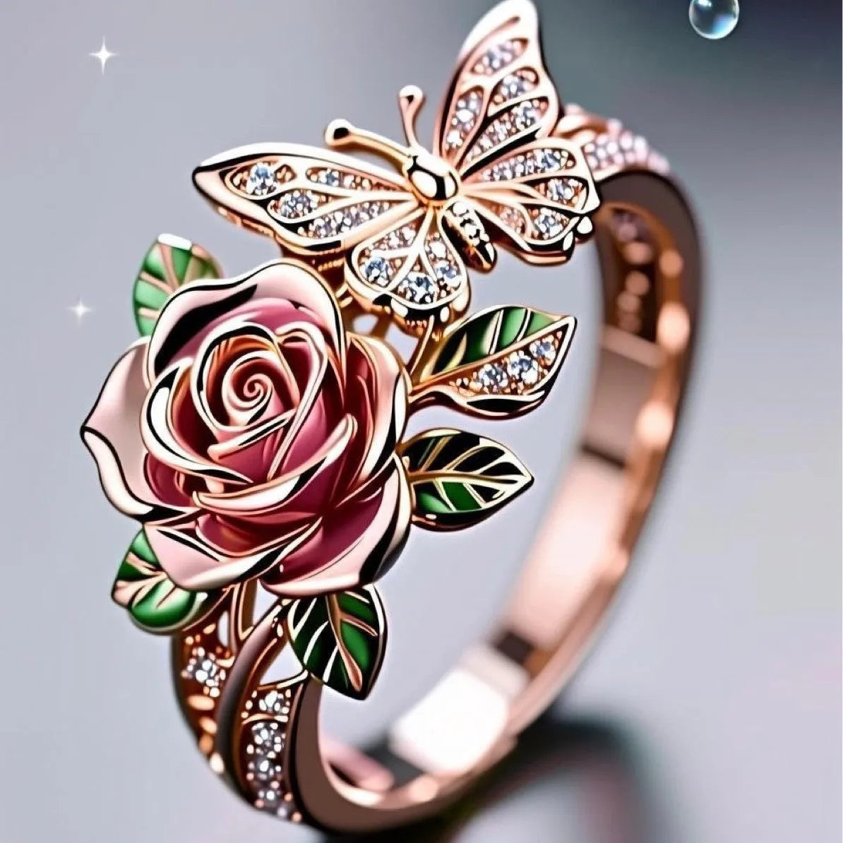 Close-up of an adjustable fairy style ring with a colourful oil-drip butterfly, rose, and leaf design in alloy.