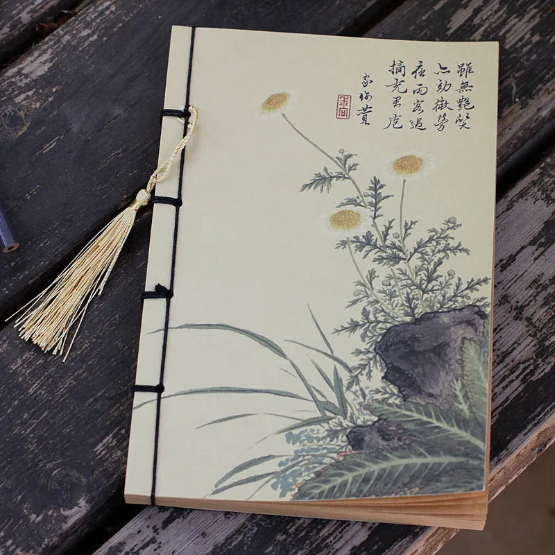 A5 antique art notebook with wire binding, decorative tassels, and traditional Chinese painting cover design