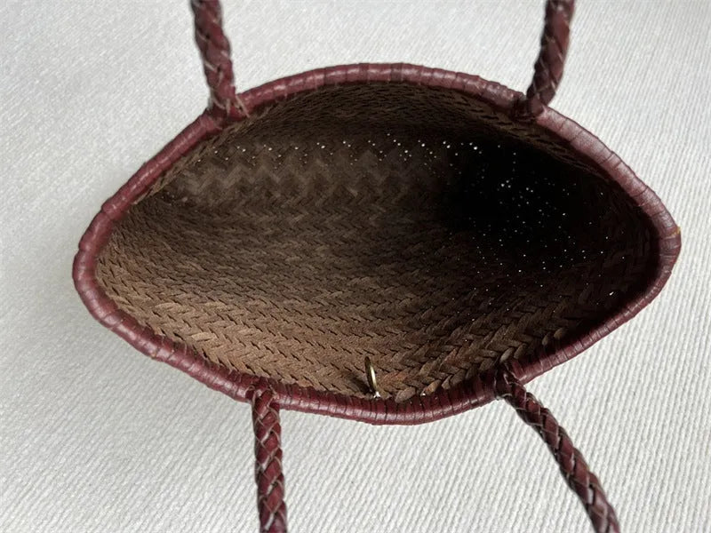 Handmade brown woven leather tote bag with three-dimensional pocket and shoulder strap