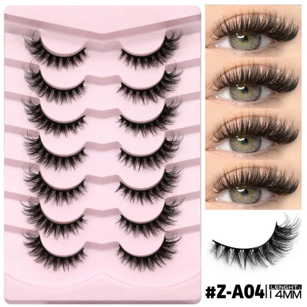 Box of artificial fibre false eyelashes in six styles with a tube of adhesive glue.