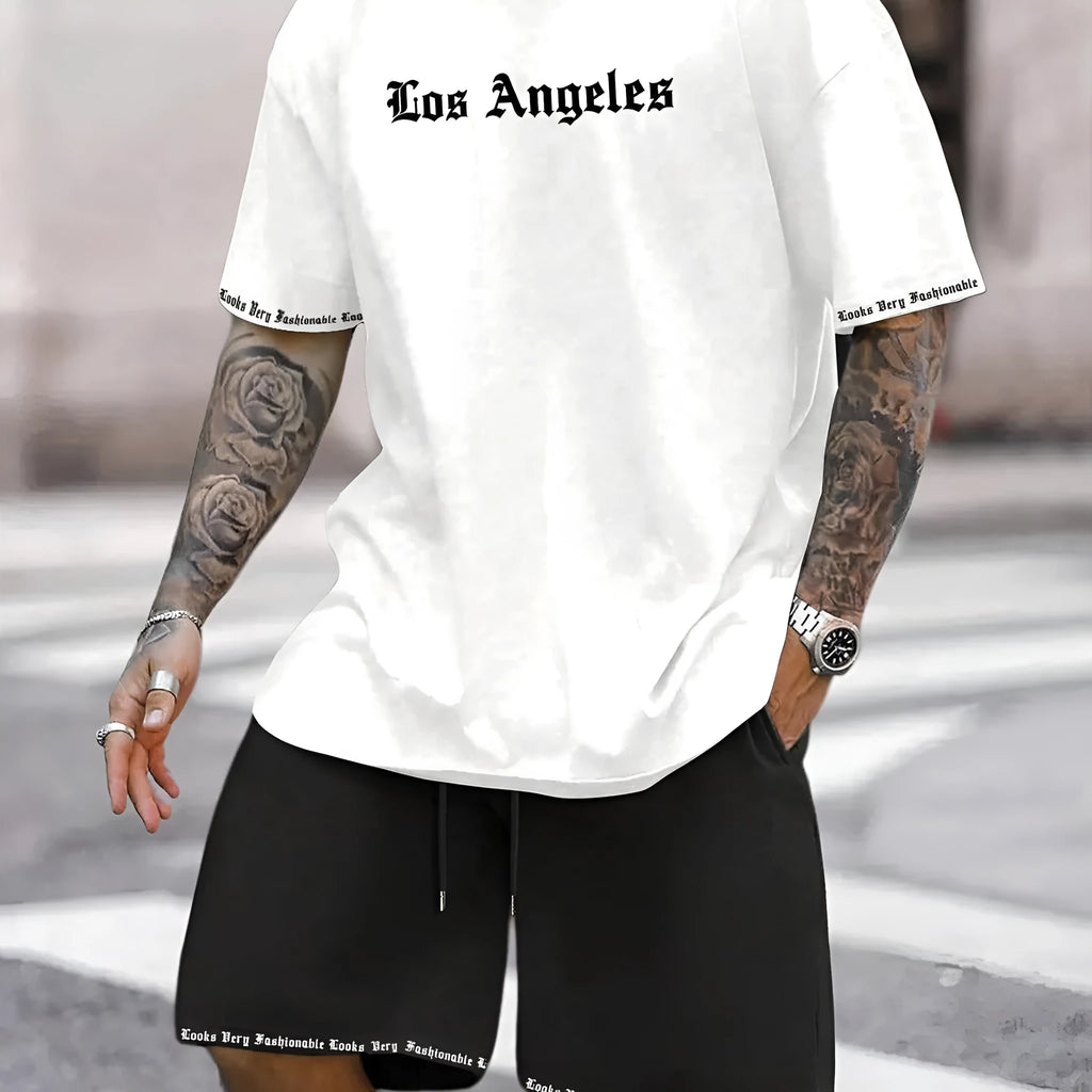 Sports style short-sleeved top and matching shorts set laid flat, showing thin polyester blend fabric.