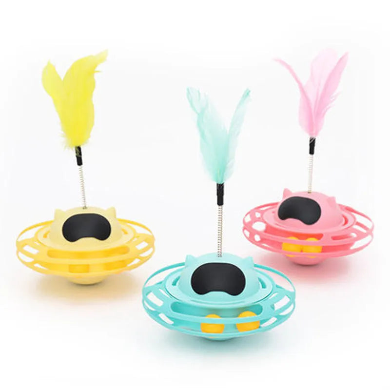 Pink self-moving cat toy with turntable base measuring 17cm by 10cm
