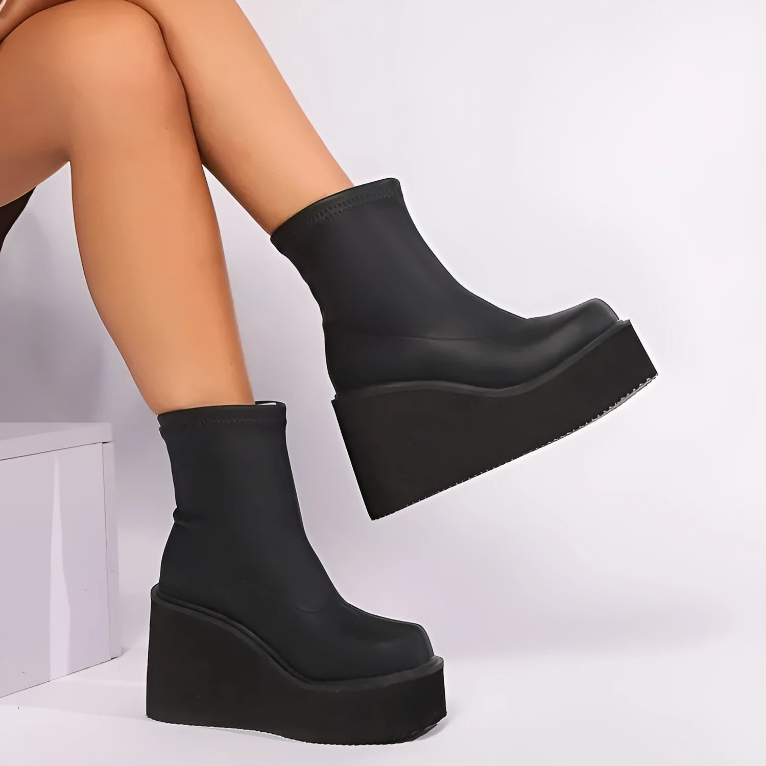 Plus size women's black wedge heel ankle boots with round toe and waterproof platform