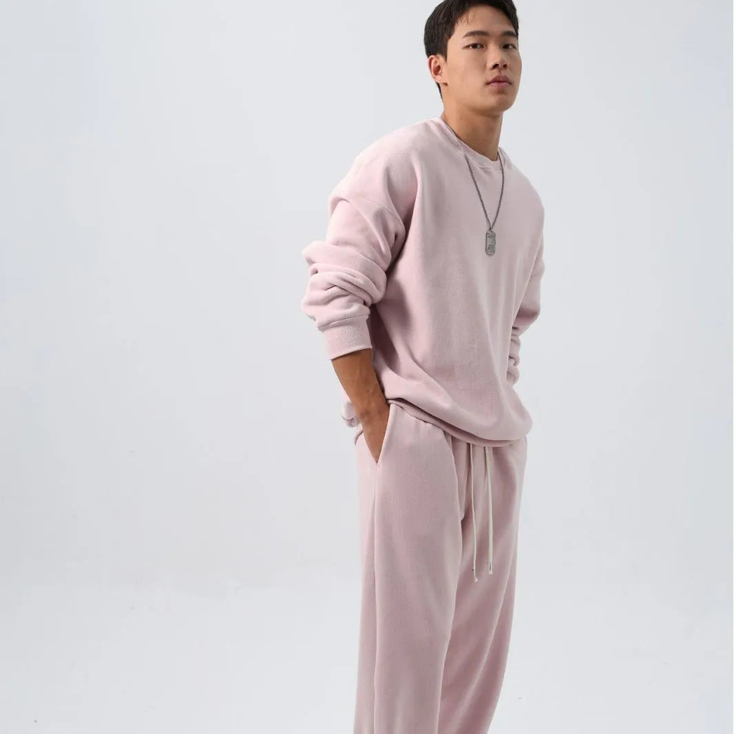 Men's black polar fleece tracksuit with crew neck jacket and matching padded trousers
