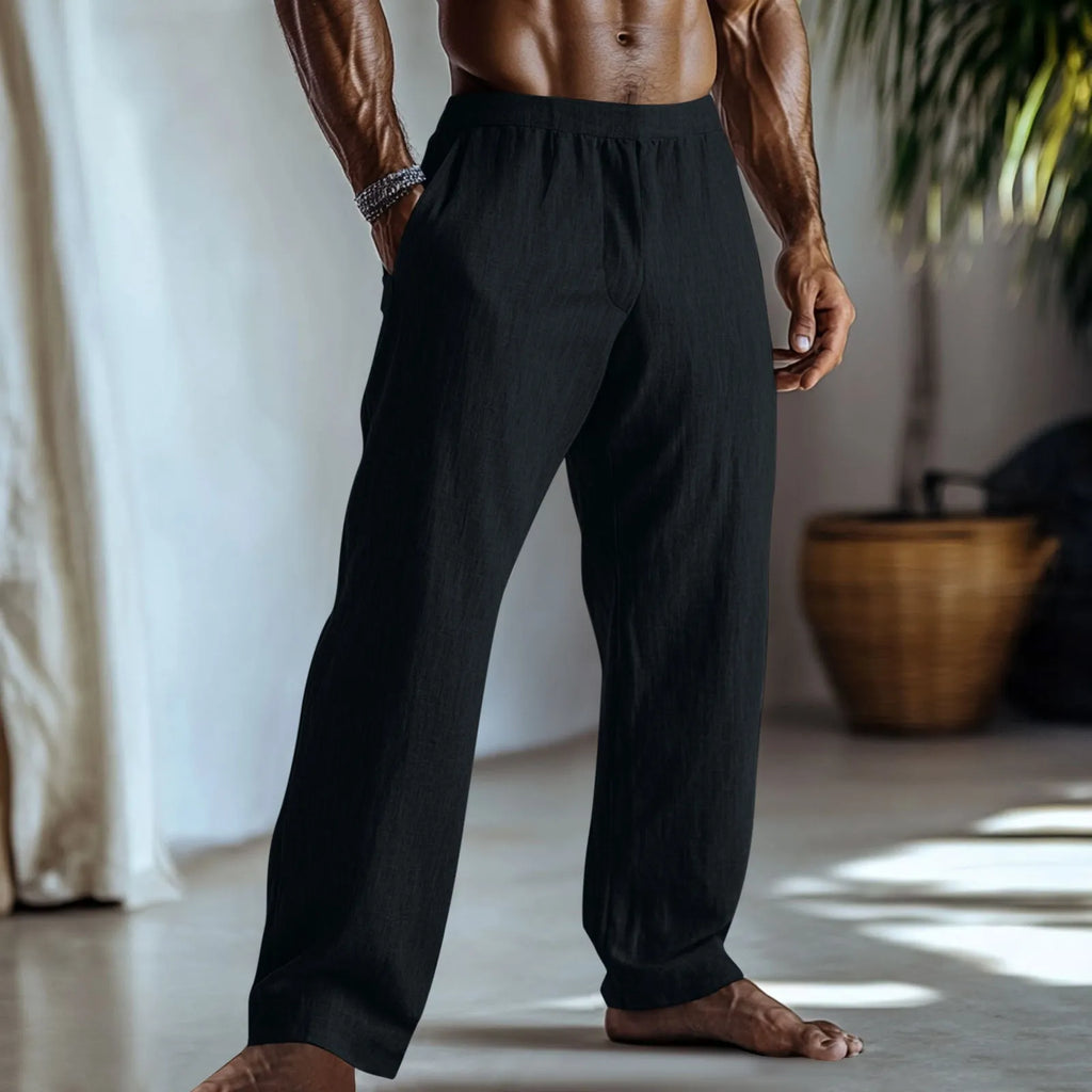 Straight-leg casual trousers in cotton and linen fabric on a hanger, showing light green colour and pocket detail