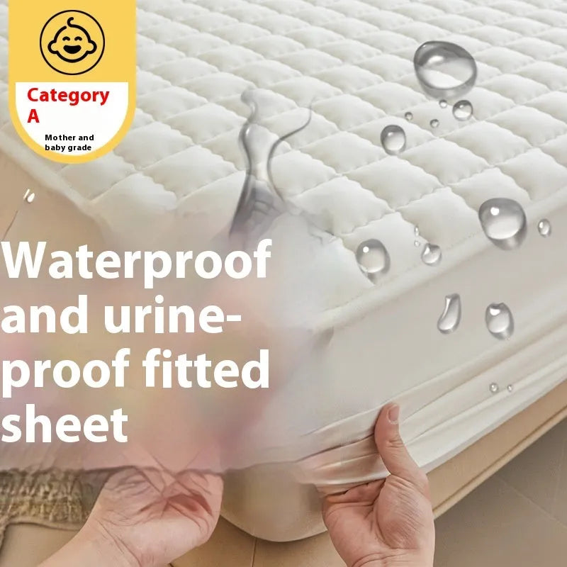Blue washed cotton waterproof fitted sheet with elasticated edges on mattress.