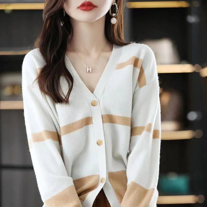 Women's slim fit V-neck cardigan with 3D striped pattern in black and white.