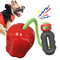 Green apple-shaped dog toy with food dropping ball and textured molar surfaces