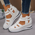 Women's black platform sandals with close-toe design and Velcro fastening