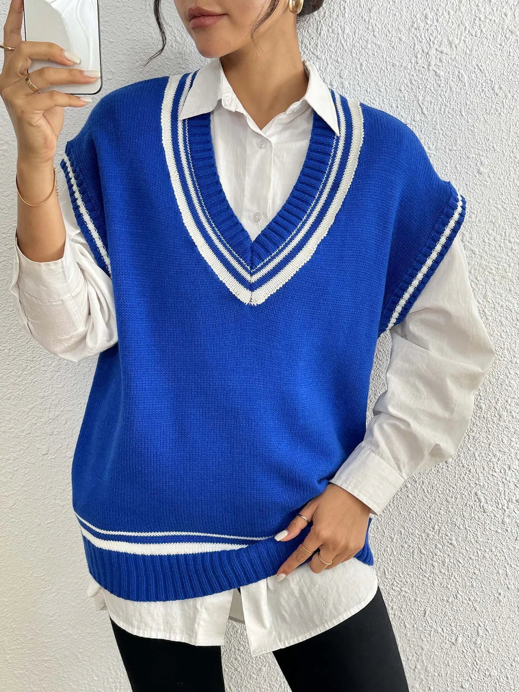 Women's casual acrylic blend vest sweater in blue colour with loose college style design