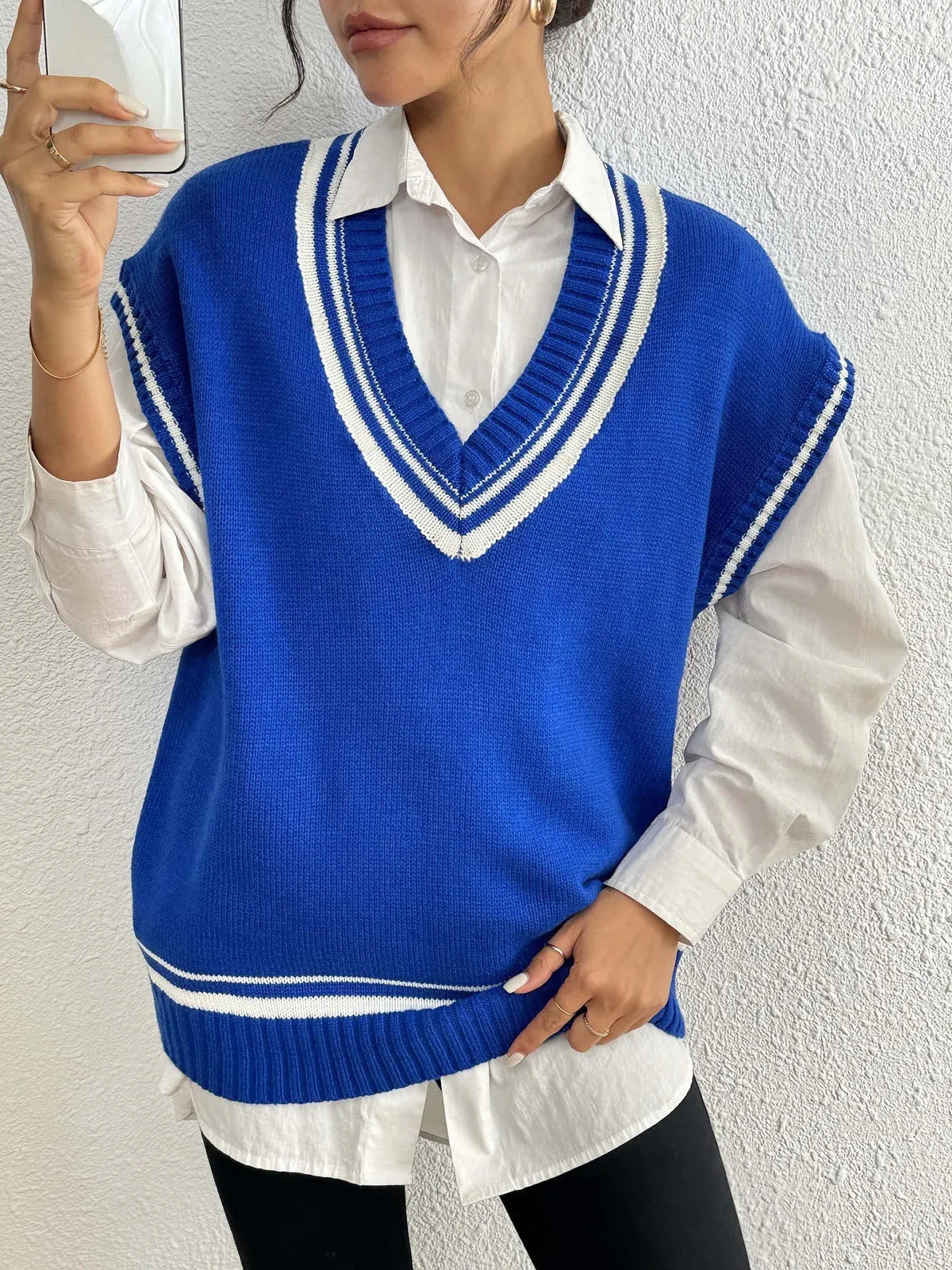 Women's casual acrylic blend vest sweater in blue colour with loose college style design