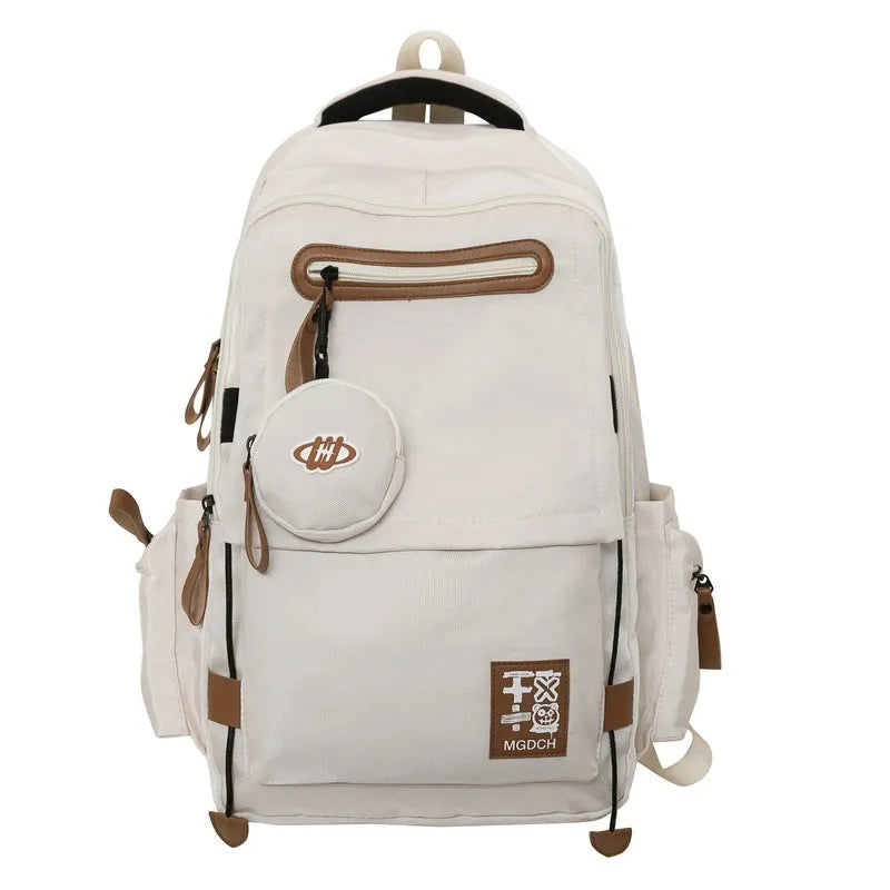 Large nylon school backpack in blue with curved shoulder straps and street style sewing detail