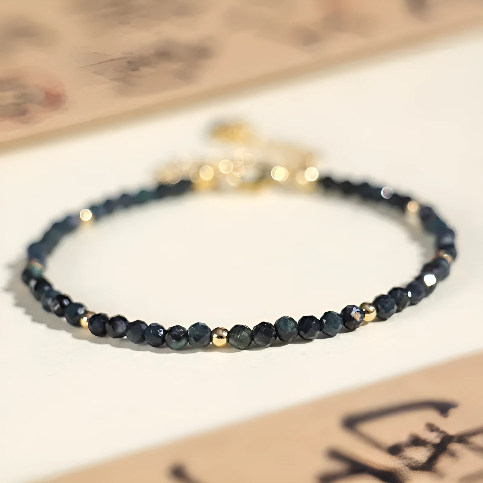 3mm blue tourmaline beaded bracelet with spacer bead design for women