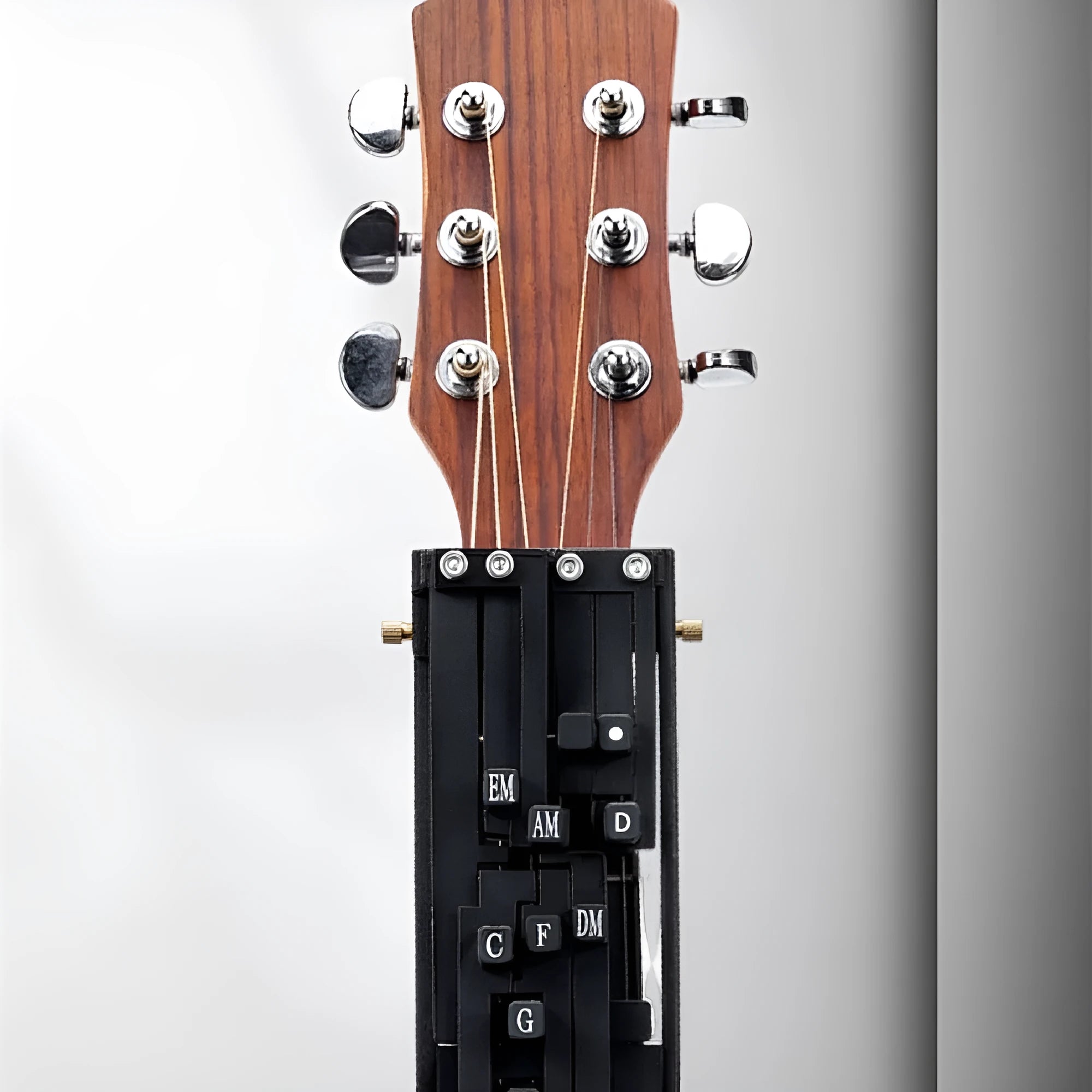 Black automatic chord practice device for beginner folk guitar players with double chord mechanism