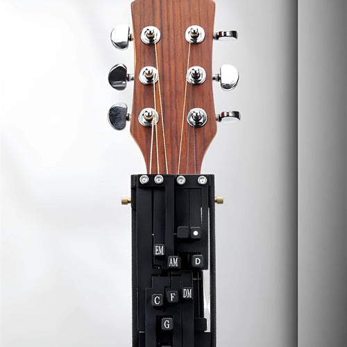 Black automatic chord practice device for beginner folk guitar players with double chord mechanism