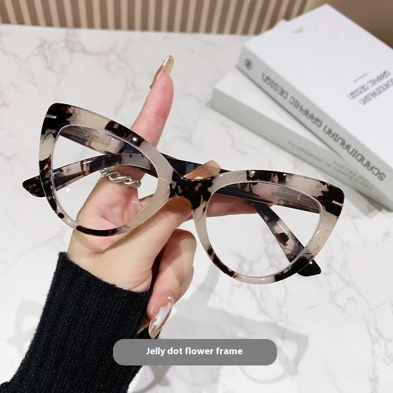 Women's cat eye shaped presbyopic reading glasses with dragon and phoenix decorations on the frame.
