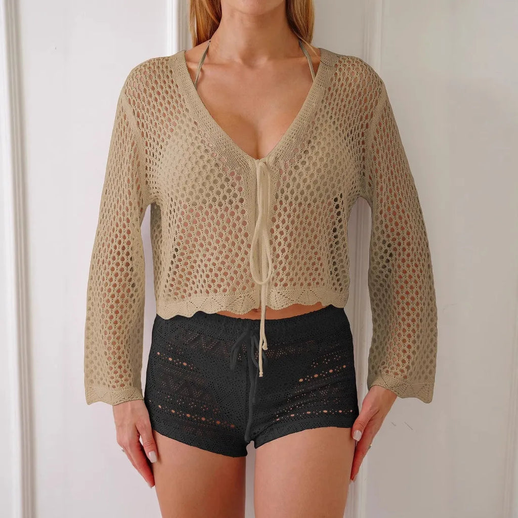 Short apricot women's cardigan blouse with bell sleeves made from hollow woven imitation cotton fabric.