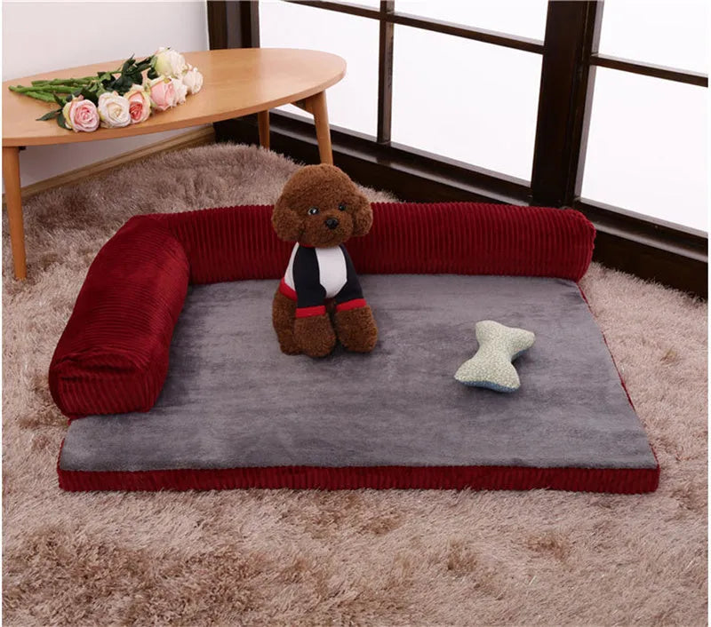 Corduroy dog sofa bed with raised sides in grey colour, showing non-slip base and cushioning.