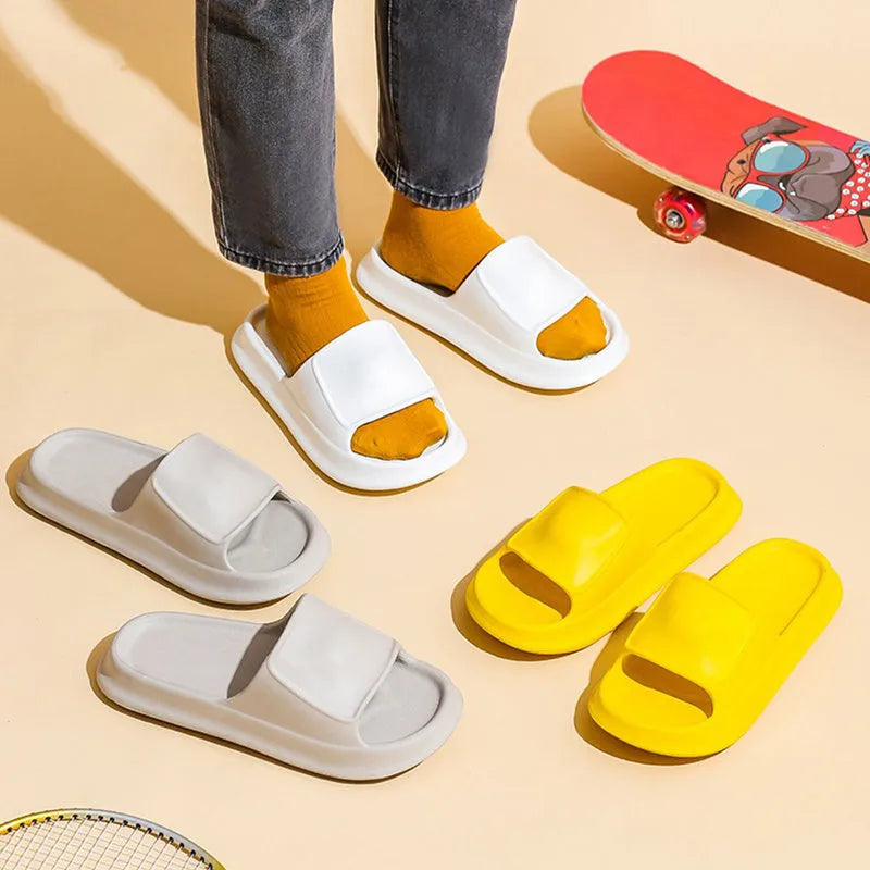 A pair of thick-soled EVA foam flip-flop slippers in a choice of seven colours on a plain background.