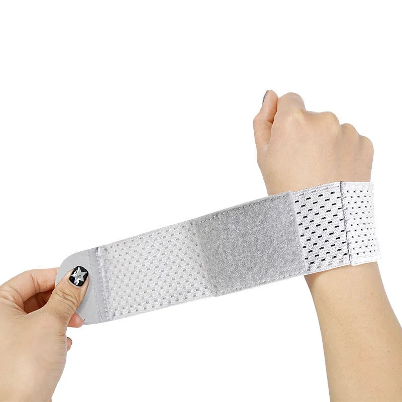 A black elastic breathable wrist guard for athletic support during gym workouts.