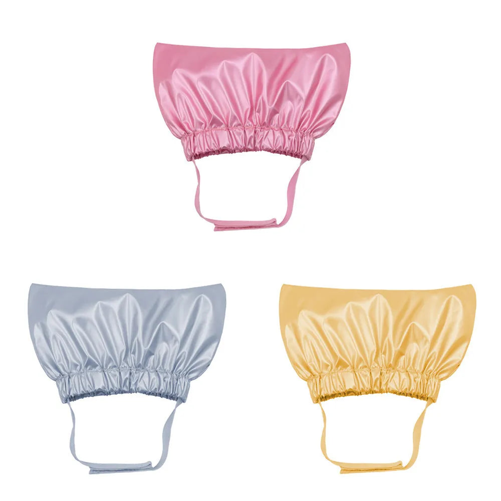 Adjustable waterproof shower cap for pets in silver, pink, and gold colours with ear protection