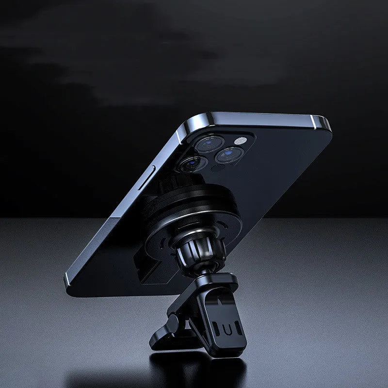 Black and white magnetic wireless charger on a table with dimensions 85.2mm x 58.4mm x 29.5mm