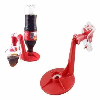 Red plastic Magic Tap soda bottle dispenser attached to a 2-litre bottle