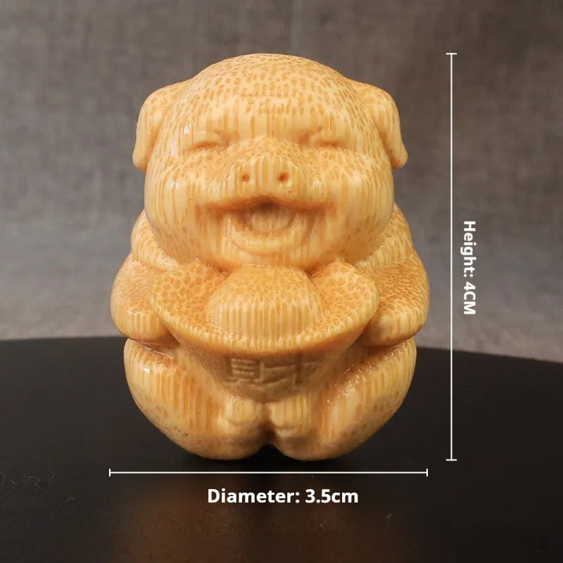 Solid bamboo carving ornament showing ingot pig design with 4cm height