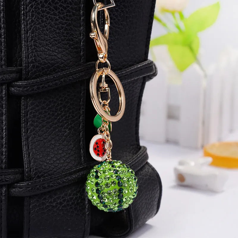 Green watermelon shaped metal keychain 12cm length with keyring attachment