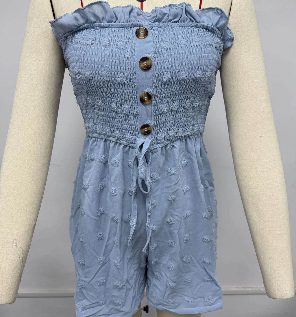 Women's solid colour off-shoulder sleeveless jumpsuit in polyester fabric on a hanger.