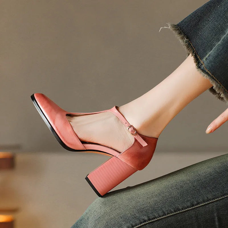 Women's dark brown retro pointed toe Mary Jane shoes with a buckle strap and hollow baotou design.