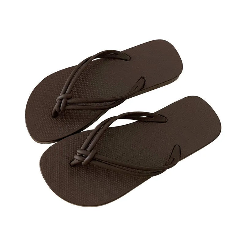 Men's PVC flip flops with toe cover design in multiple colour options showing injection moulded construction
