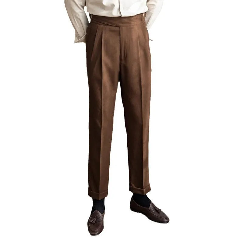 Man wearing high waist straight leg casual trousers in black polyester fabric.